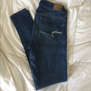 American Eagle low rise medium wash skinny jeans